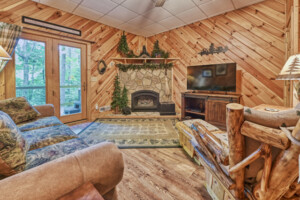 Main level bedroom with king size bed and full bathroom.