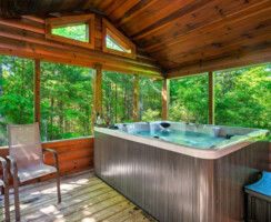 Ultimate relaxation in the hot tub in the private screened in porch.