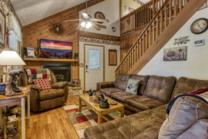 View of living room from kitchen. Gas fireplace