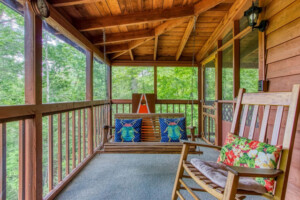 Screened in porch with table/rockers/swing