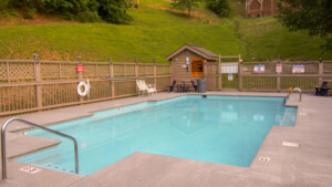 Seasonal community swimming pool ~1min drive from cabin.