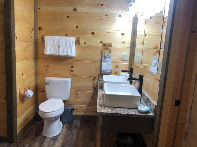 Master bath ~ luxury granite and copper sinks create a real spa experience