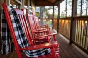 Settle into the front deck rocking chairs as the day fades away.