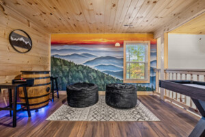 Capture your Insta-worthy vacation memories with group photos against the custom Smokies wall mural.