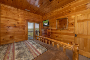 lower level bedroom with full bath and porch