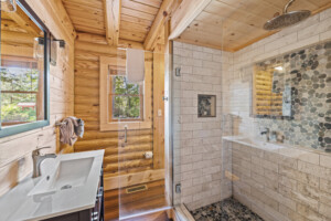 Full bathroom with waterfall shower on main level