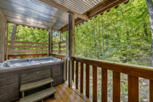 5 person Hot Tub w/multi color changing LED lights and wooded view.