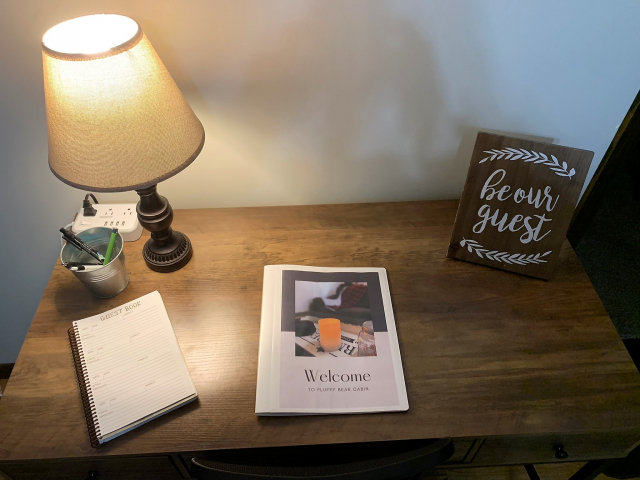 Desk and welcome book. 