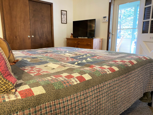 Master has access to the screened in porch.  Hot tub is on the screened in porch. 