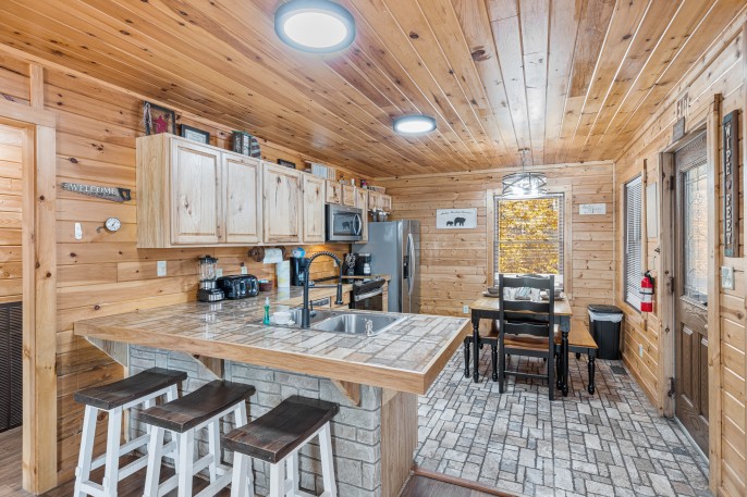 lower level deck w/ hot tub and propane grill