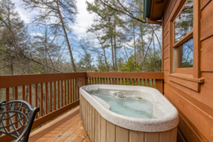 Relax in the 2-Person Hot Tub and Take in the Wooded Views