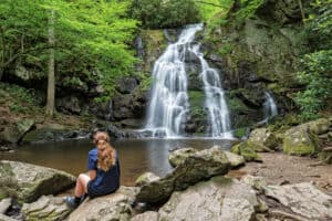 woman looking at tremont waterfall