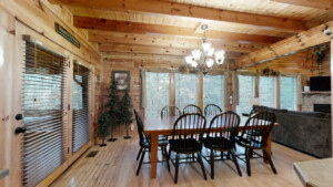 Log cabin dining room with seating for 8 people
