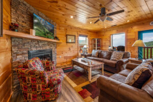 The living room is on the main floor and offers a pull out couch & fireplace