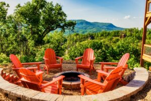 Our real wood burning fire pit even has a view of the valley and Bluff Mountain.