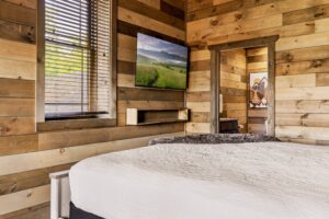 Another view of the downstairs king bedroom. Private bathroom.