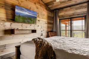 Upstairs level King bedroom with a view. Private bathroom.