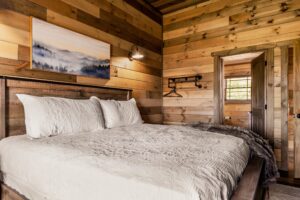 Another view of upstairs level King bedroom with a view. Private bathroom.